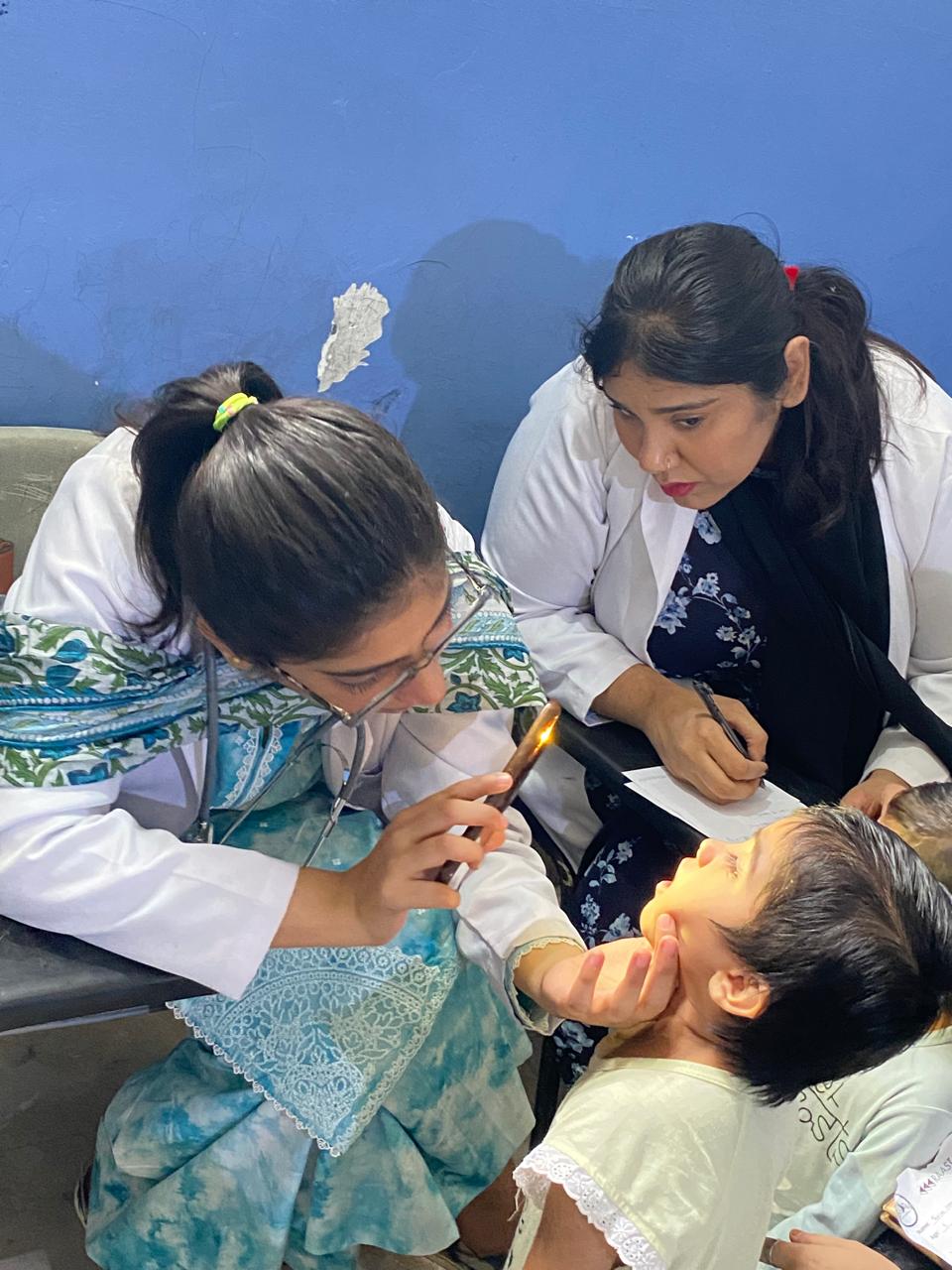 Doctor treating a child